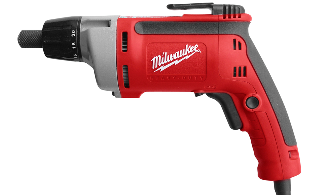 A power drill with a clutch screwdriver tip. A power drill with a clutch screwdriver tip.
