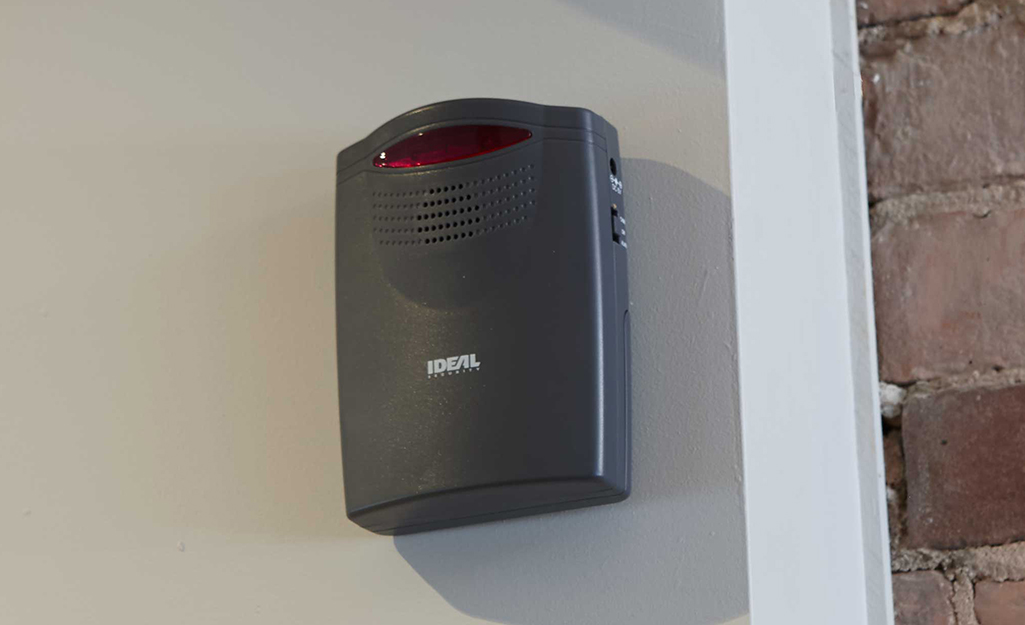 A motion detector timer on the wall.