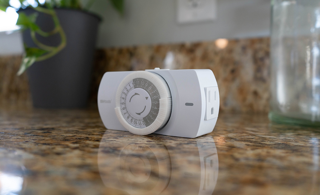 A mechanical timer on the kitchen counter.