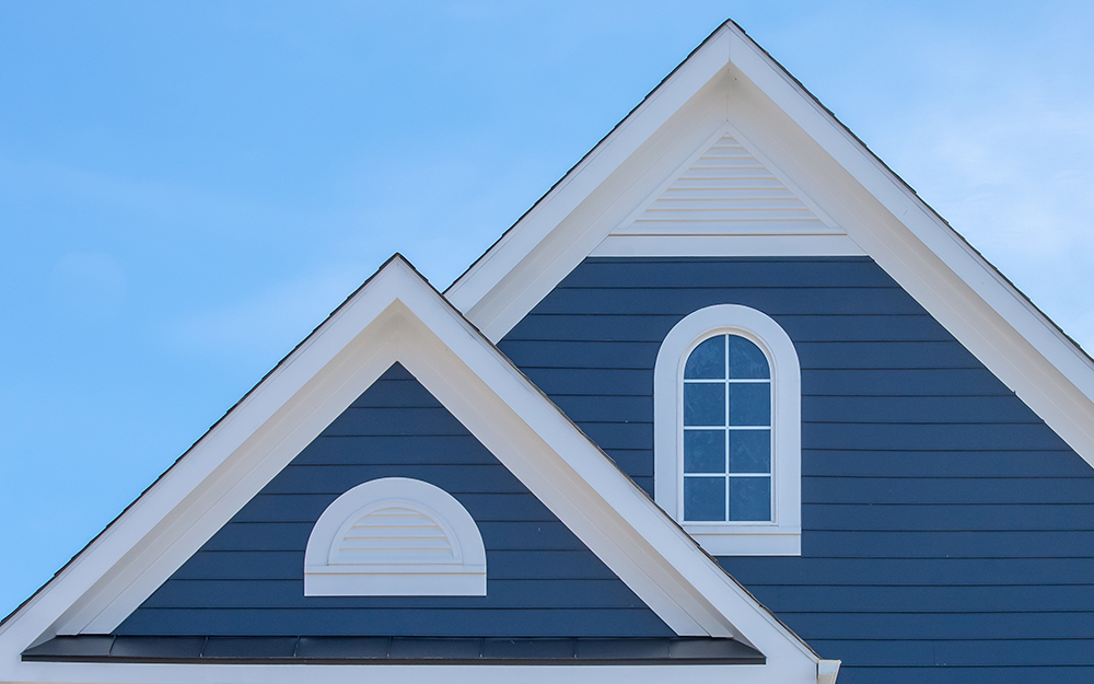 A gable roof with both a gable vent and a window.