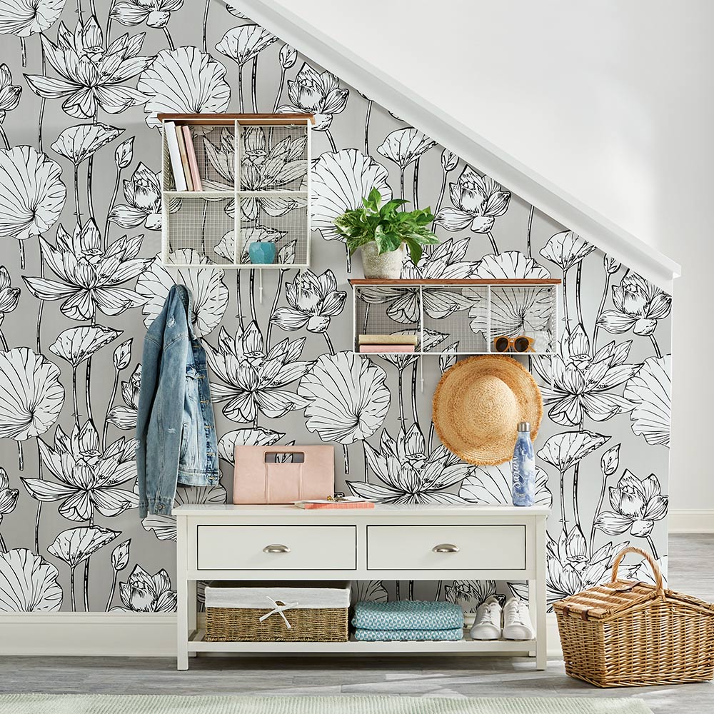 An entryway with flower patterned wallpaper. An entryway with flower patterned wallpaper.
