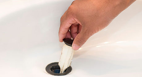Remove Sink Stopper - Clearing Sink Drains with Plunger