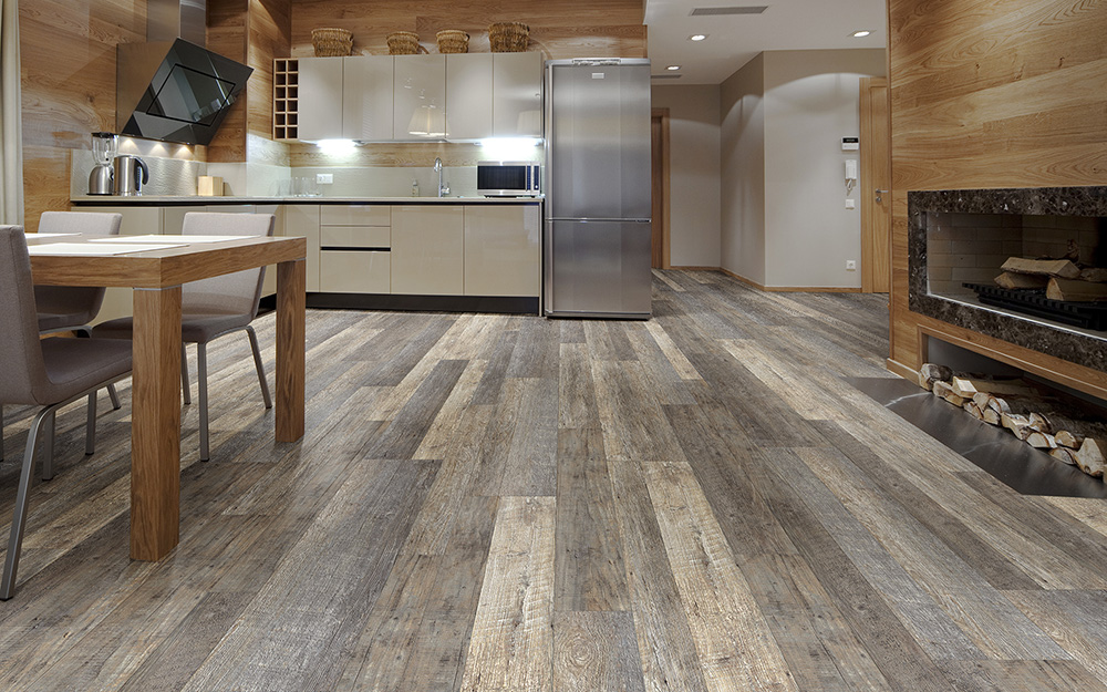 Vinyl sheet flooring installed on a large kitchen floor.