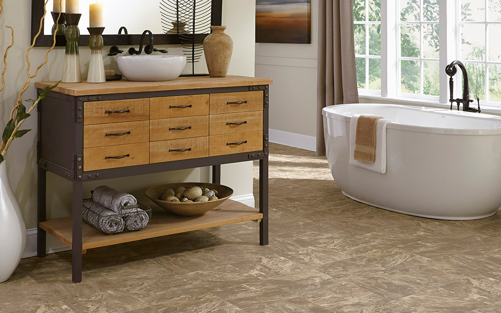 A bathroom featuring dark brown peel-and-stick vinyl tiles.