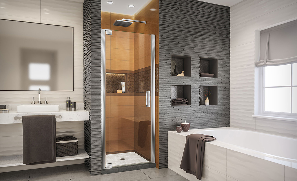 A bathroom with a walk-in shower and a separate tub.