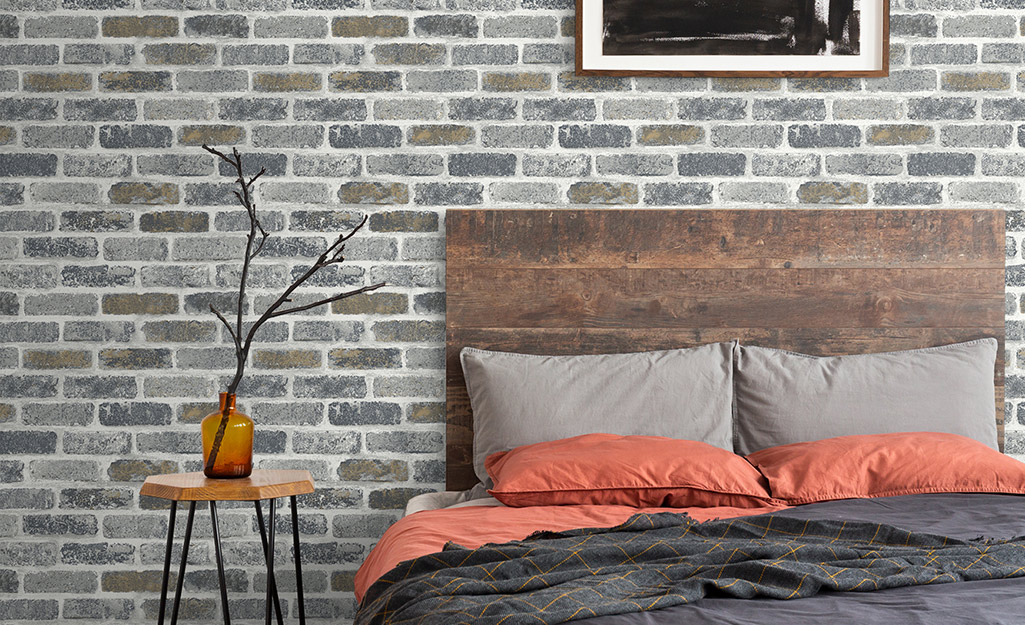 A textured accent wall in a bedroom.