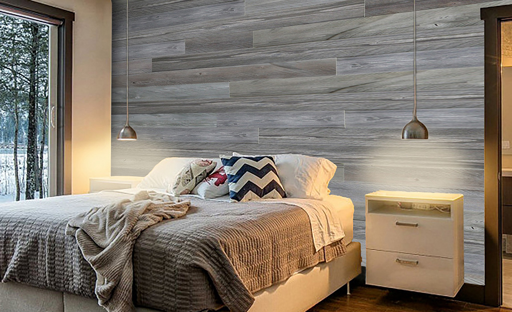  A wood accent wall in a bedroom.