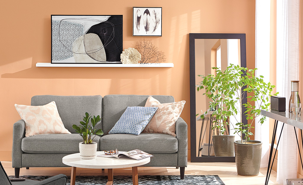 How to Decorate the Sofa Wall with Artwork - YourHomeVibe