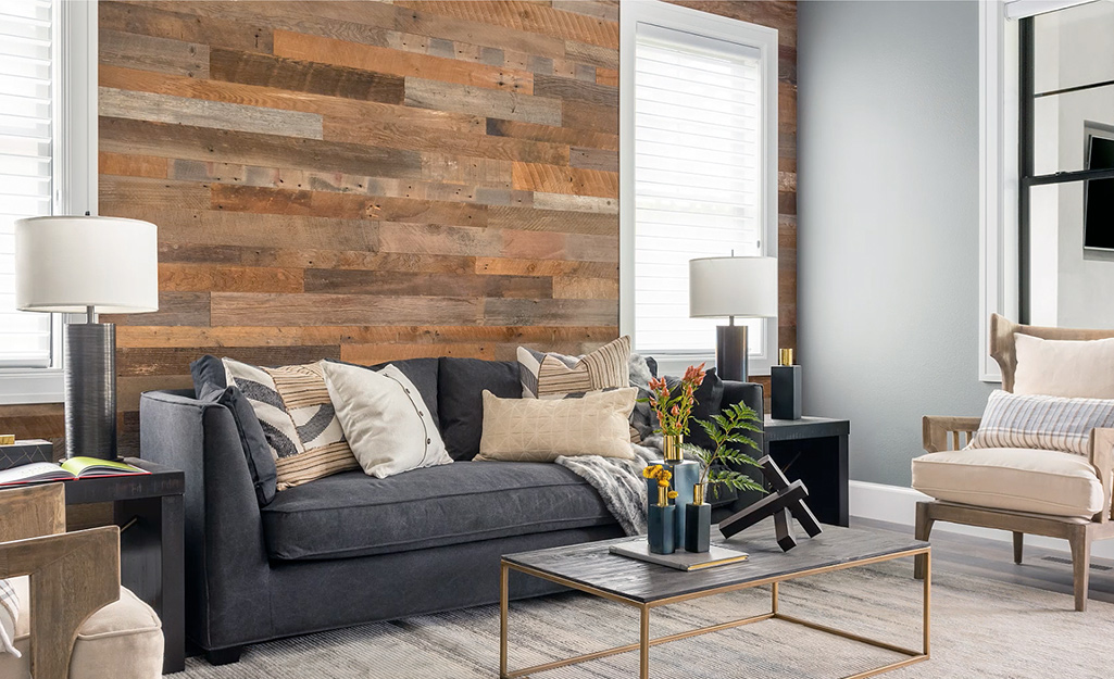 A wall covered with barn wood paneling.