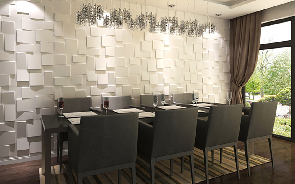 A dining room featuring 3D style wall paneling.