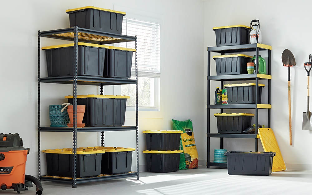 A neatly organized garage features two storage shelves.