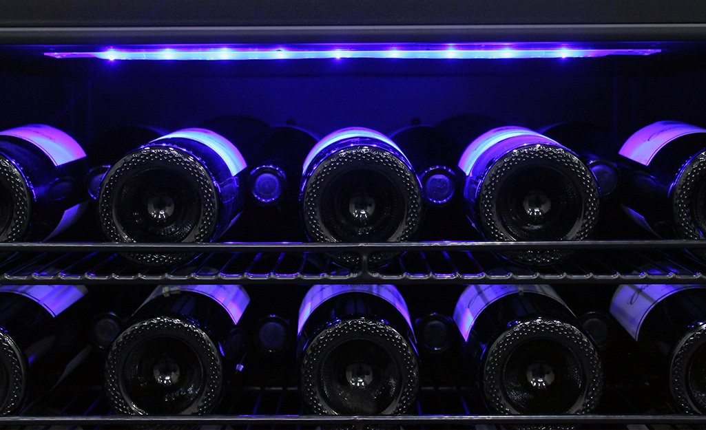A wine cooler features special lighting to reduce UV exposure.