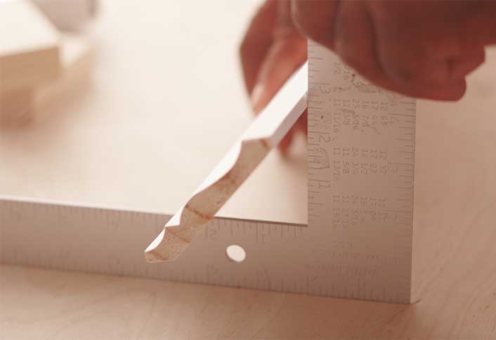Put moulding against framing square - Install Crown Moulding Put moulding against framing square - Install Crown Moulding