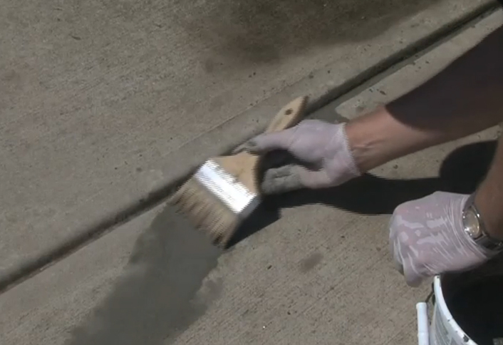 Wet surface and apply concrete agent - Minor Sidewalk Repairs Wet surface and apply concrete agent - Minor Sidewalk Repairs