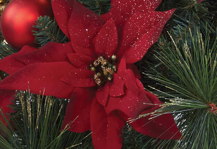 Add holiday ornaments - How to Make Poinsettia Centerpiece Add holiday ornaments - How to Make Poinsettia Centerpiece