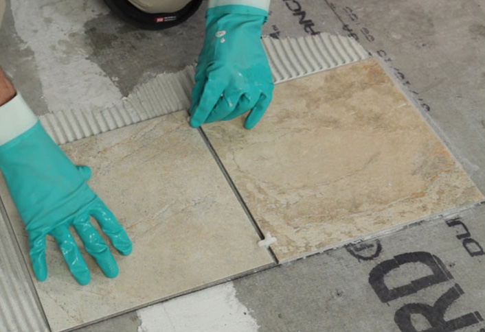 Place second tile alongside first spacers - Floor Tiles Place second tile alongside first spacers - Floor Tiles