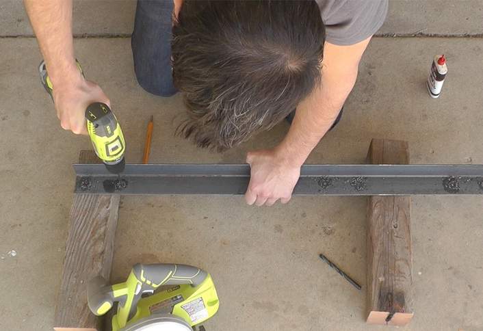 Drill through the angle irons - Build a Grilling Cart Drill through the angle irons - Build a Grilling Cart