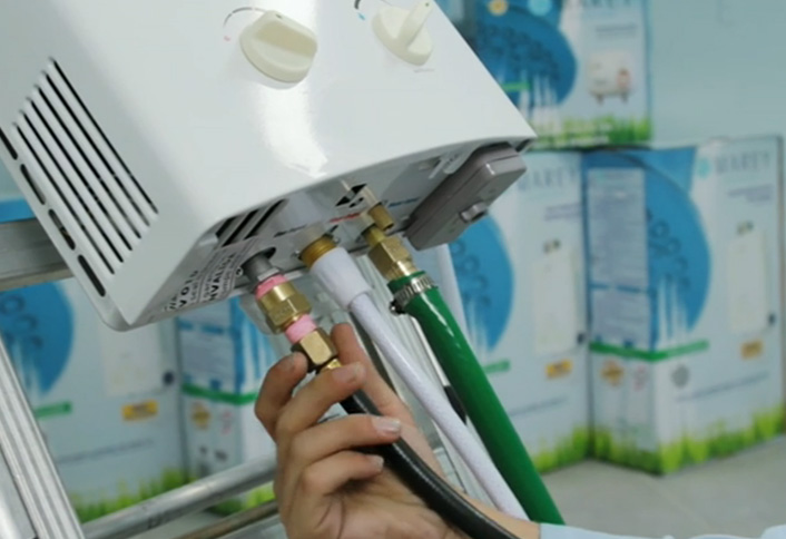 Screw the unit to the wall - On-Demand Water Heater Screw the unit to the wall - On-Demand Water Heater