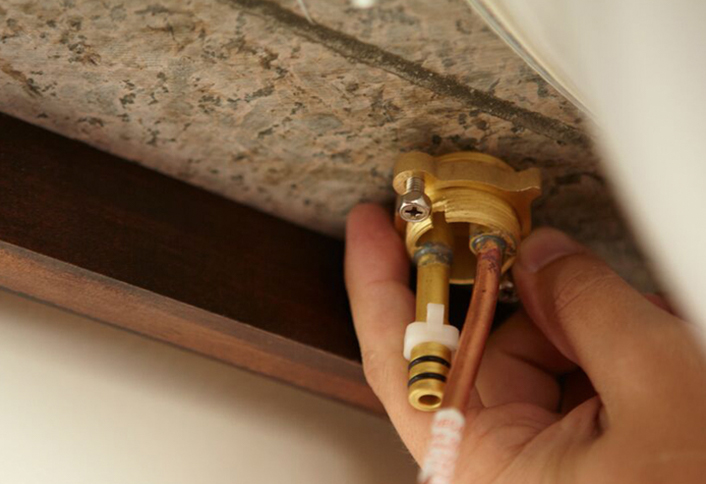 Hand-tighten basin nut - Install Widespread Faucet Hand-tighten basin nut - Install Widespread Faucet