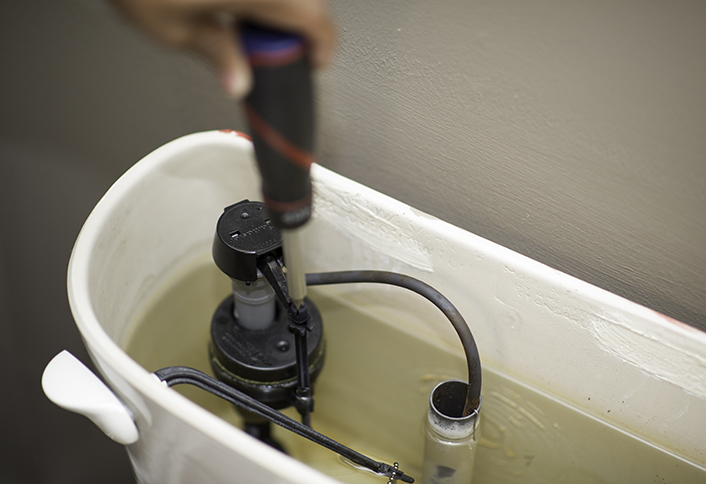 Adjust the tank handle - Minor Adjustments Your Toilet Adjust the tank handle - Minor Adjustments Your Toilet