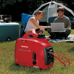 EU1000 Generator powering a laptop at campsite
