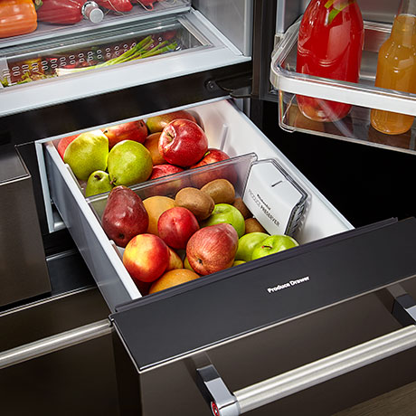 External refrigerator drawer, fully open, stocked with apples and pears. External refrigerator drawer, fully open, stocked with apples and pears.