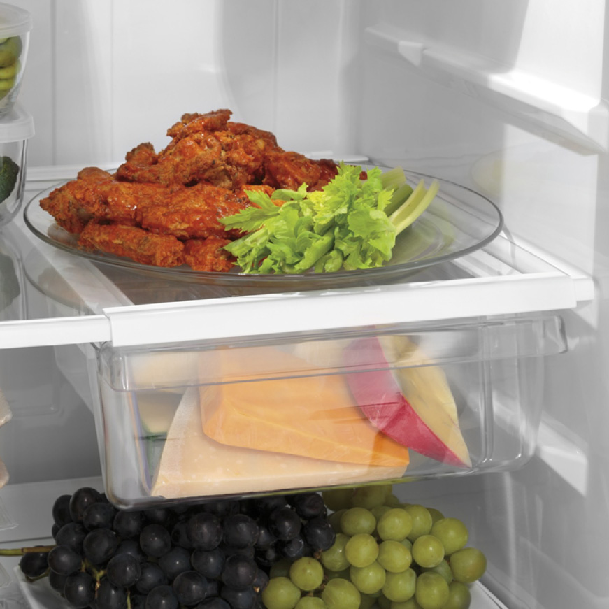 GE Appliances, the best bottom freezer refridgerator for food organizing. The snack drawer holds a variety of cheeses.