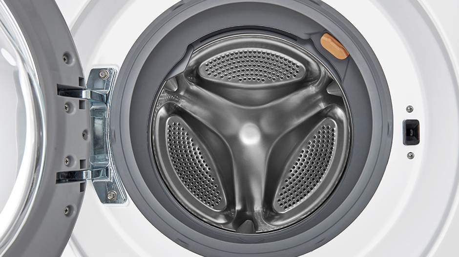 A close up shot into the interior of an LG large capacity front load washer A close up shot into the interior of an LG large capacity front load washer