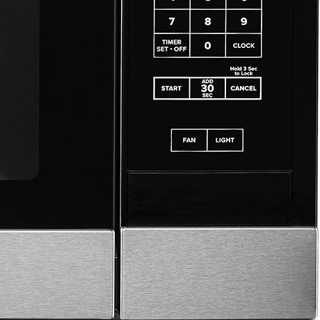 The control panel with a button labeled Fan. The control panel with a button labeled Fan.