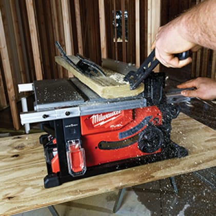 Man cuts wood with M18 FUEL 8-1/4" Table Saw