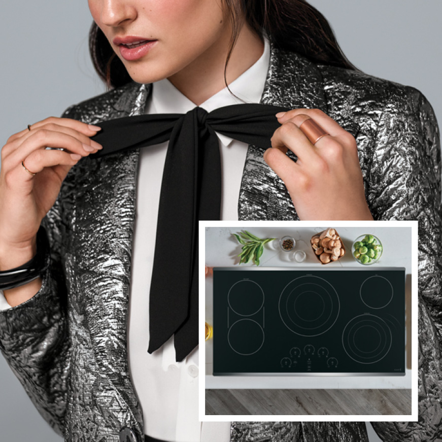A woman dressed in fashionable clothing adjusts her ribbon-tie. A photo of a cooktop is superimposed in the lower-right corner. A woman dressed in fashionable clothing adjusts her ribbon-tie. A photo of a cooktop is superimposed in the lower-right corner.