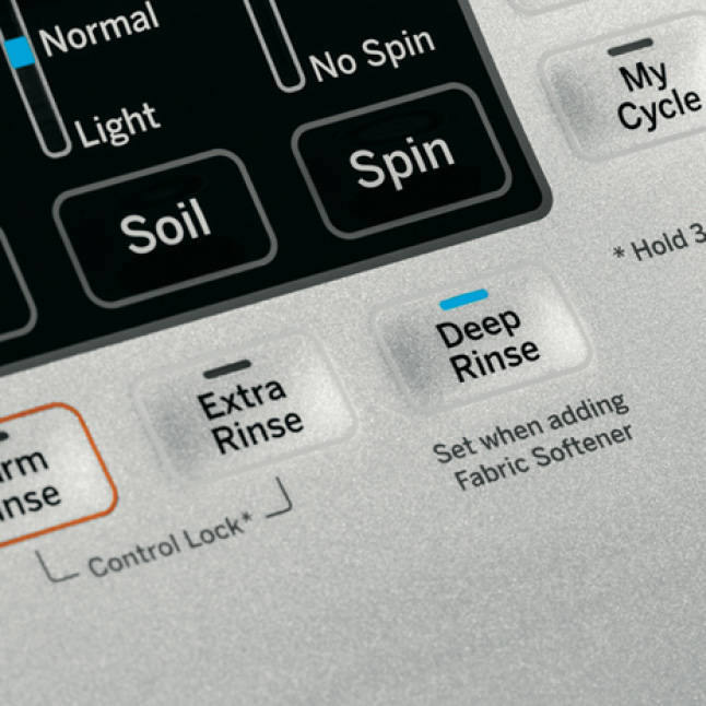 Warm Rinse, Deep Rinse and Extra Rinse options on the control panel of a GE washer