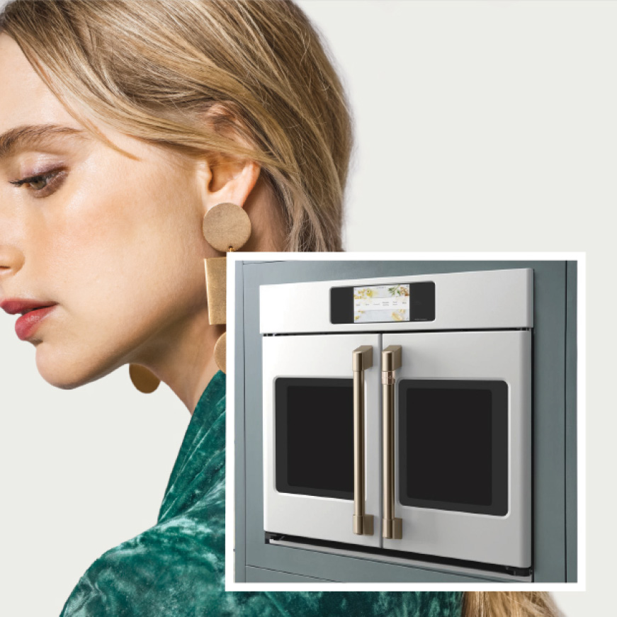 Beauty shot of woman with image of single wall oven in set Beauty shot of woman with image of single wall oven in set