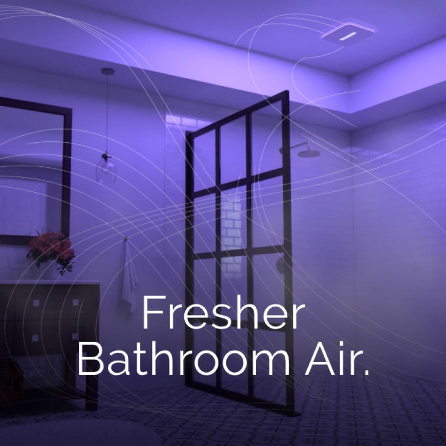 Image of a modern-looking bathroom with the violet hue of the SurfaceSheild  illuminating the space. Wispy lines circulating  represent air movement.