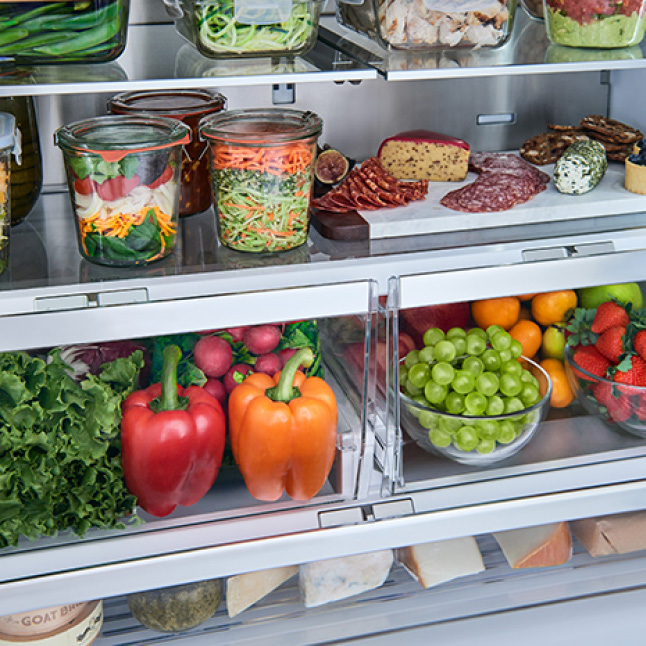 Full Bosch Refrigerator with fruits and vegetables