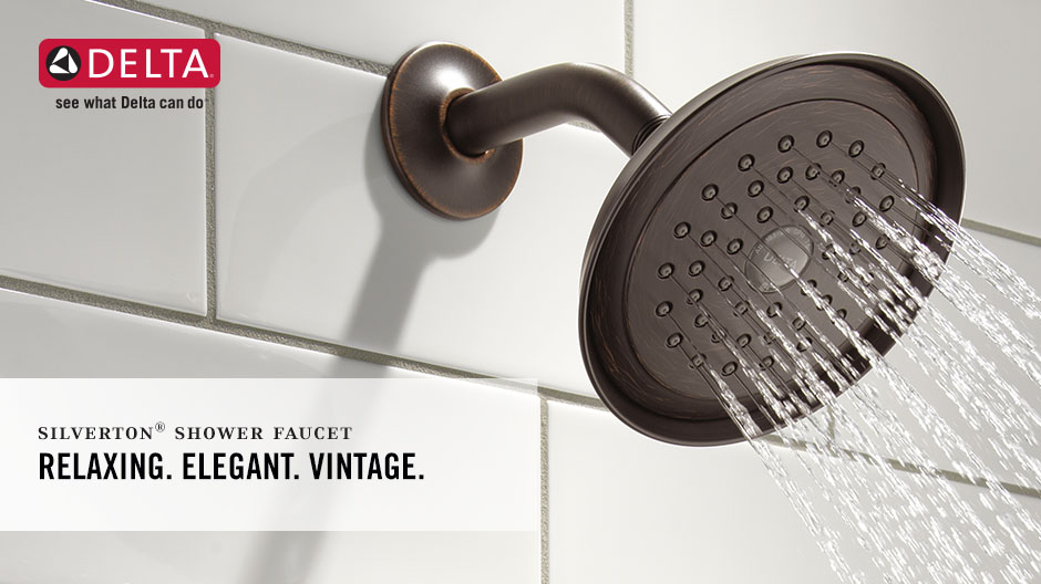 Image depicts an up-close shot of the shower head with water on Image depicts an up-close shot of the shower head with water on
