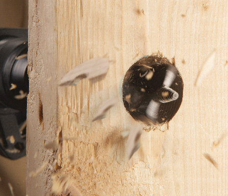 Bosch Daredevil spade bit tip drilling hole through wood.