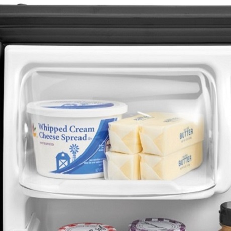 Cream cheese and butter in dairy bin