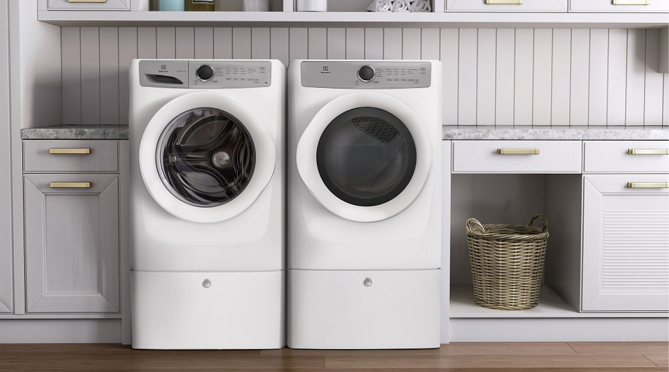 Washer and dryer on pedestals in laundry room Washer and dryer on pedestals in laundry room