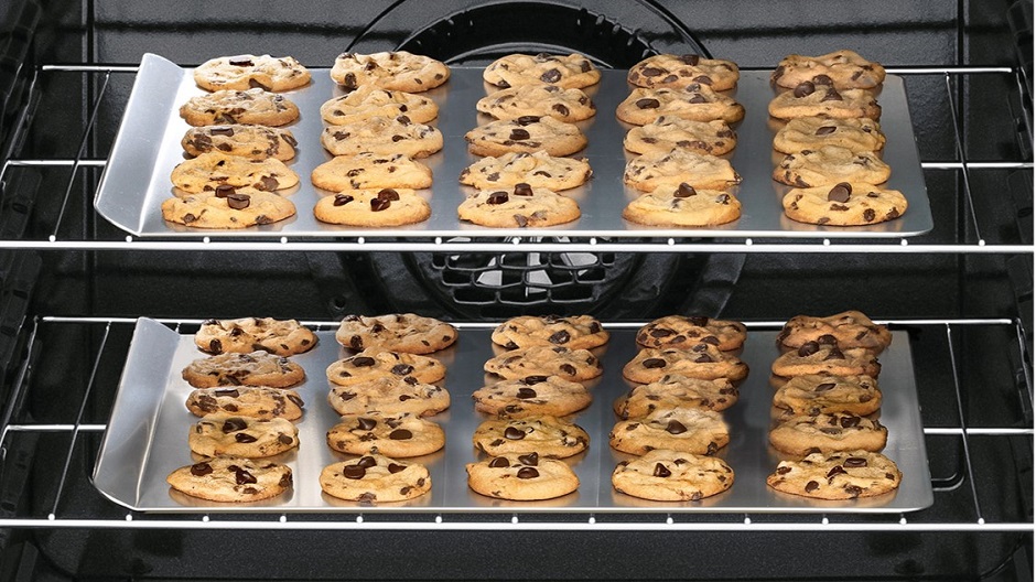 Cookies backed on multiple oven racks Cookies backed on multiple oven racks