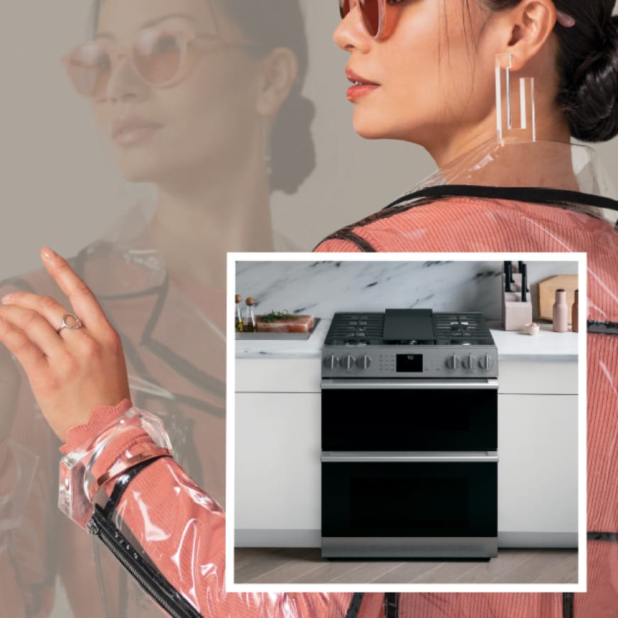 Beauty shot of woman with image of Modern Glass gas double oven range in set Beauty shot of woman with image of Modern Glass gas double oven range in set