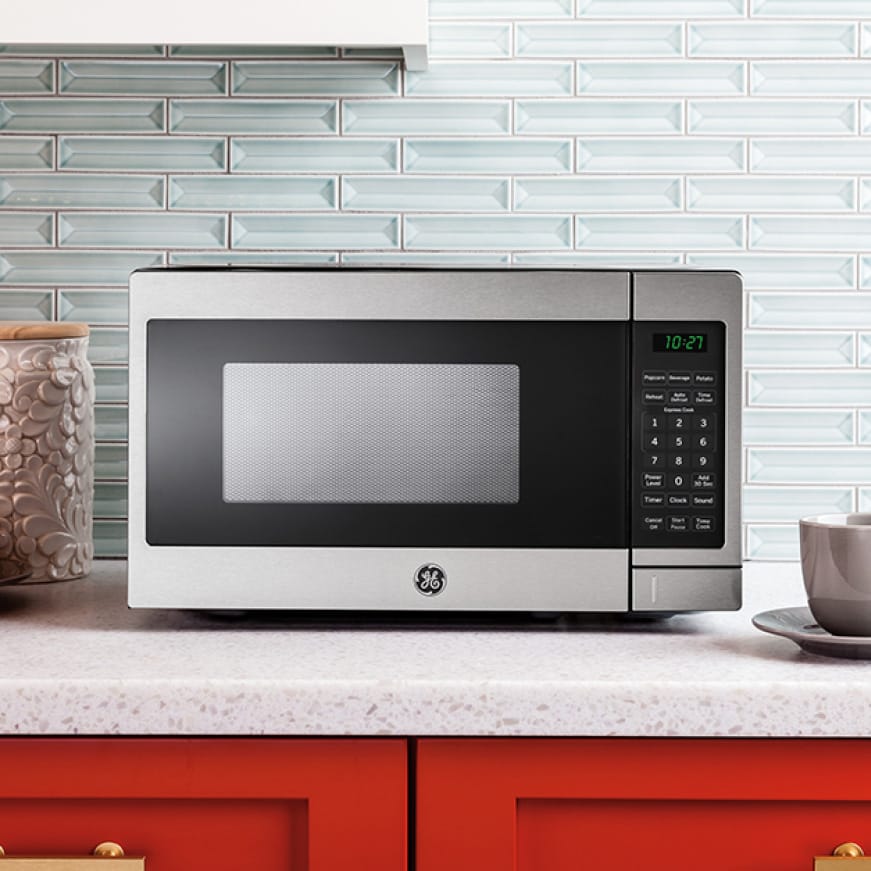 The microwave sits on a countertop
